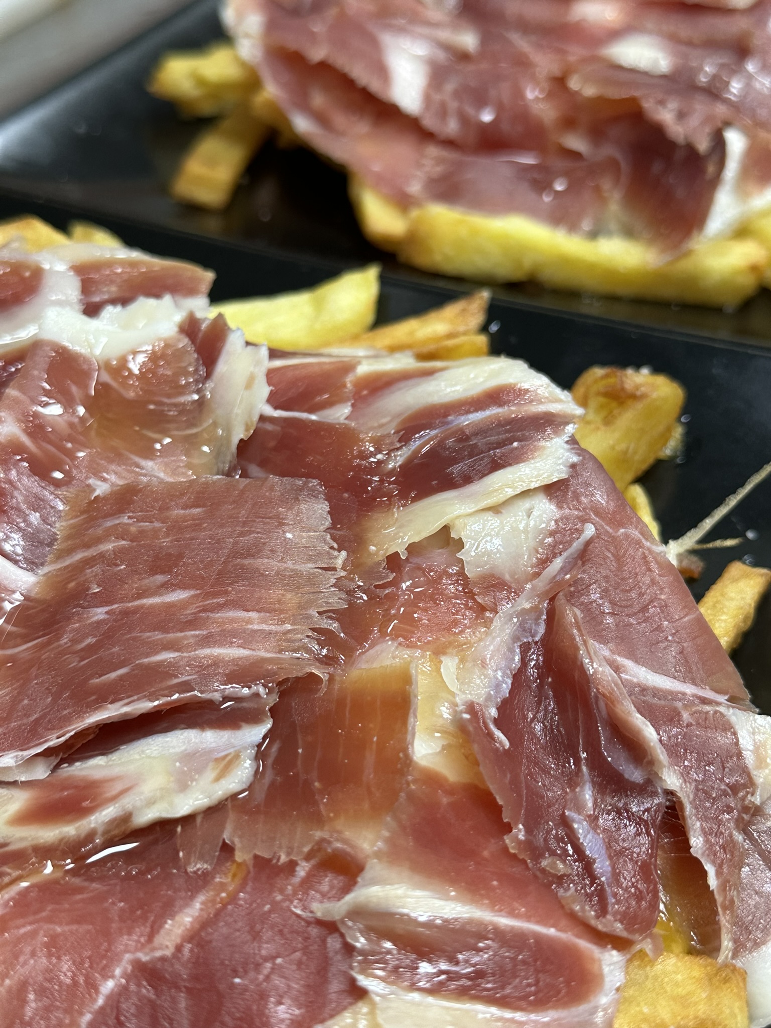 huevos rotos con jamón